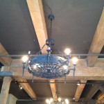 One of the new chandeliers not quite all lit up